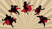 istock Super Business Heroes Team Silhouettes in Action 1442939177