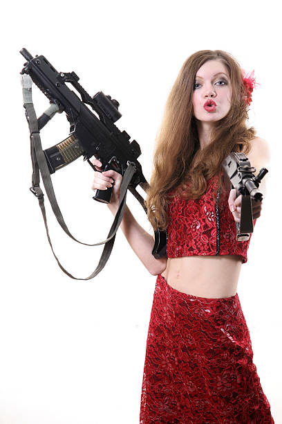 Girl with weapon stock photo