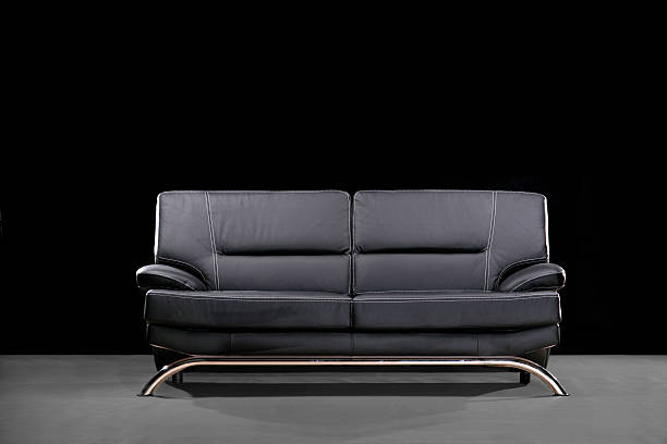 Black leather sofa stock photo