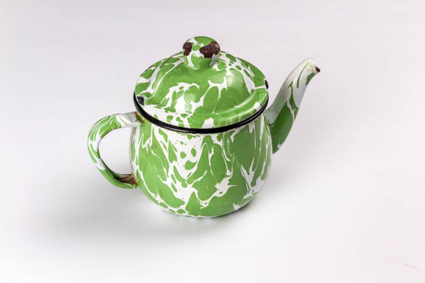 istock Teko blirik, Indonesia classic enamel teapot. Isolated on white background 1442940804