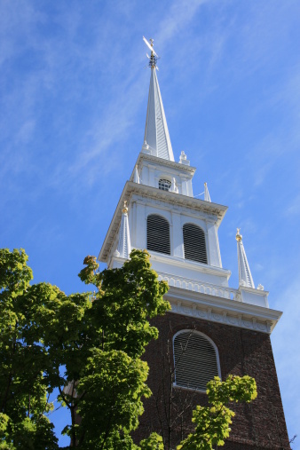 Millennium Tower and Park Street Church in Boston, Massachusetts, USA