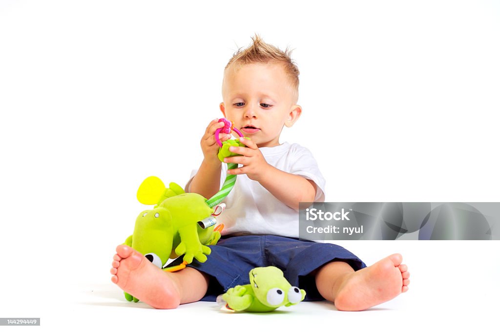 Bebê com brinquedos toca - Foto de stock de 12-17 meses royalty-free