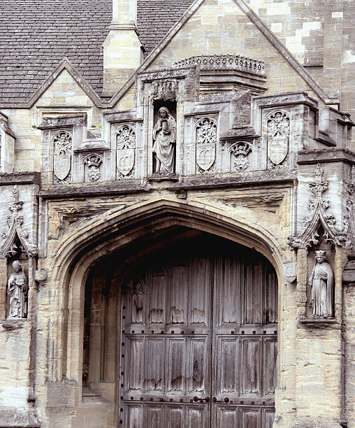 istock Oxford university, weatherworn medieval gate 144294593