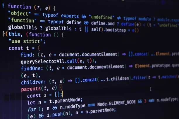 Photo of Software source code. Programming code. Programming code on computer screen. Developer working on program codes in office. Source code photo. Technology background