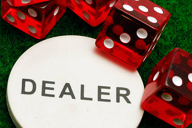 istock Red dice and dealer button. 144294973