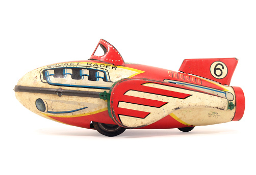 old tin rocket toy       