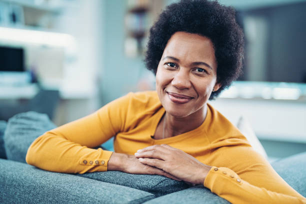 Portrait of an African woman at home stock photo