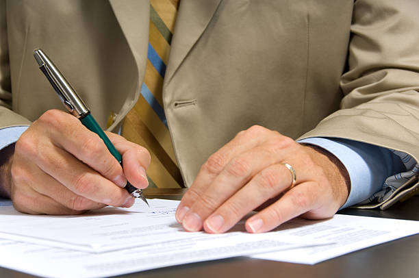 istock Businessman signing a contract 144296010