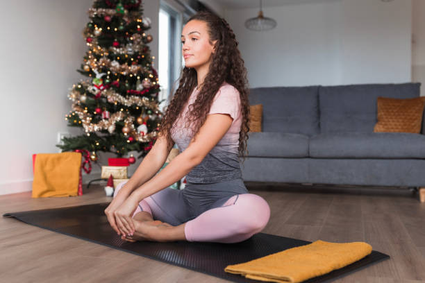 istock Fit woman concentrating on stretching workout 1442960218