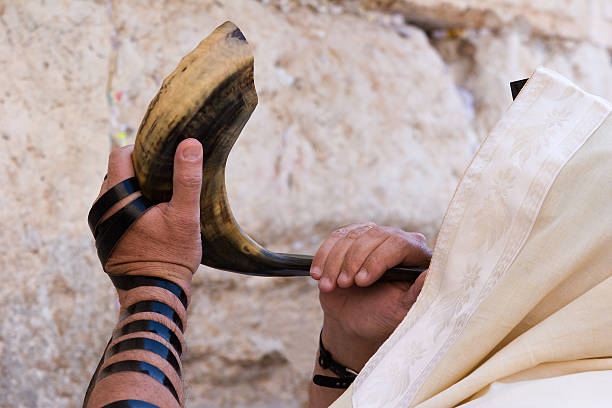 Jew blowing in shofar of Rosh hashana. \r\nJew blowing in shofar of Rosh hashana. rabbi photos stock pictures, royalty-free photos & images