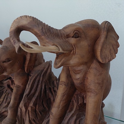 carved elephant statue from teak wood