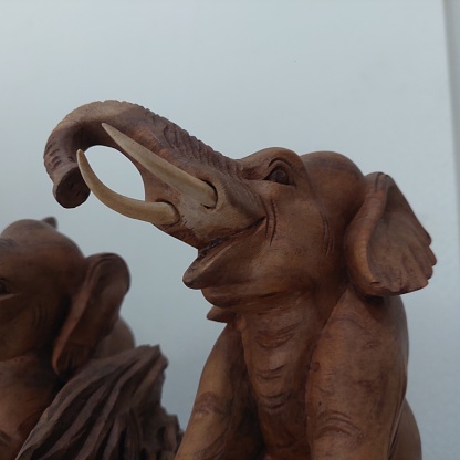 carved elephant statue from teak wood