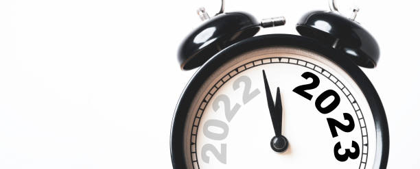 istock Clockwise move to change 2022 to 2023 on black alarm clock with copy space , Preparation of Merry Christmas and Happy new year concept. 1442966659