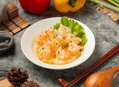 Pineapple Shrimp Balls served in dish isolated table top view of chinese food
