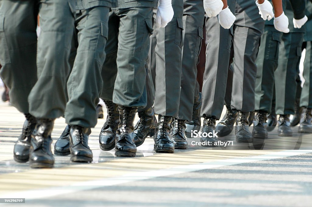Marching in unision Marching participants march in unision parade Accuracy Stock Photo