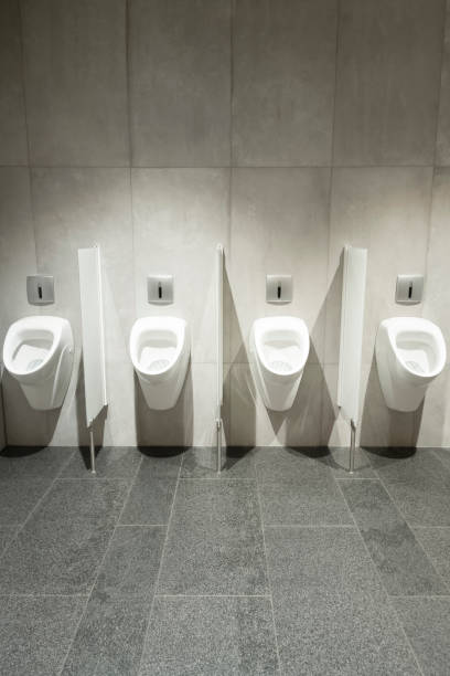 row of urinal toilet blocks in men public toilet or restroom - urinal clean contemporary in a row imagens e fotografias de stock