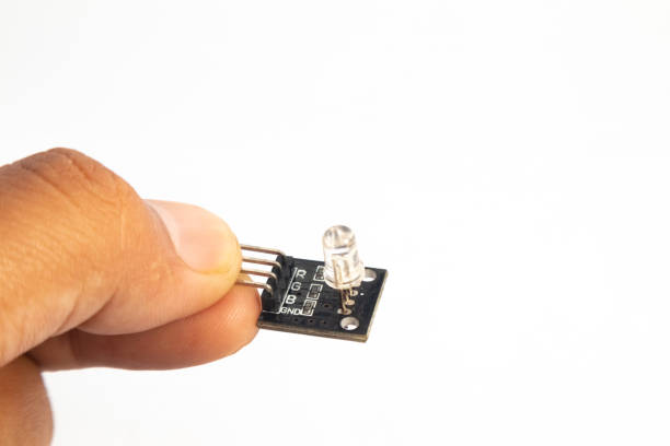 istock Front side view of a hand held RGB LED module. This module is used for electronics hobbyists for DIY materials. 1442979919