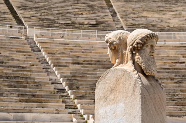 Athens, Greece - May 2022: Ancient statue of heads in the city's historic Olympic stadium