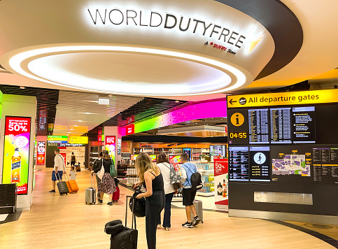 London, England - August 2022: Sign above the entrance to the duty free shop at an airport. The shop is operated by Dufry