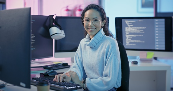 Portrait of happy woman, computer coding and software development, cybersecurity analytics and seo data for cloud computing. Young female programmer, IT worker and developer writing code for website