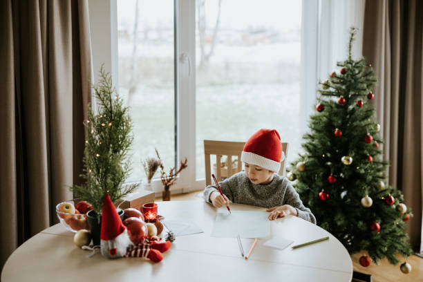 istock Boy writes a letter to Santa Clause 1442981820