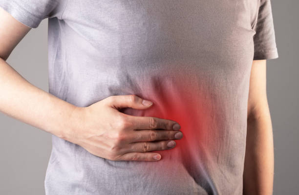 istock Liver pain and disease concept. Problem, red inflammation in abdominal area. Chronic illness, cirrhosis 1442988677