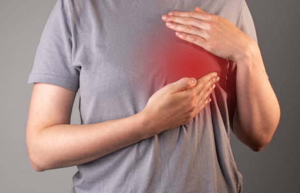 istock Breast cancer examing, self checking of lumps, touching for detection 1442988726