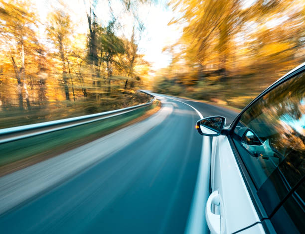 istock Driving on the road on a beautiful autumn day 1442990436