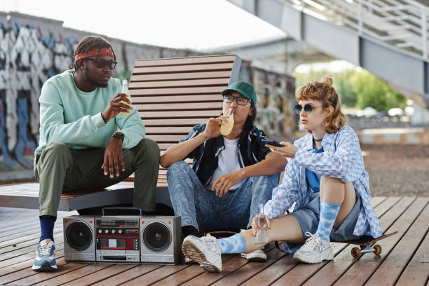 istock Diverse group of young people hanging out 1442992444