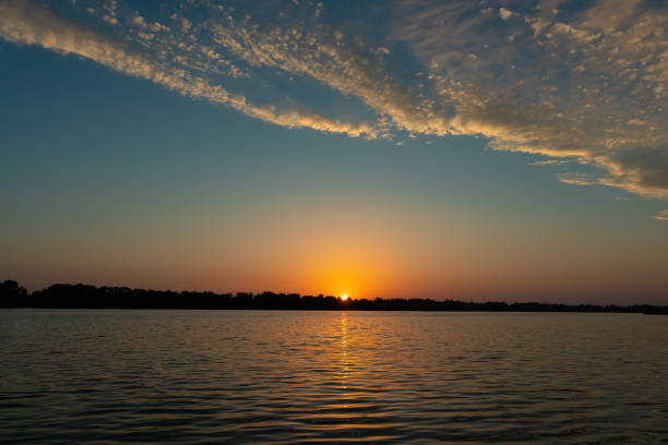 istock Beautiful sunset over the Dnieper river in Ukraine with sky gradient colors 1442994758