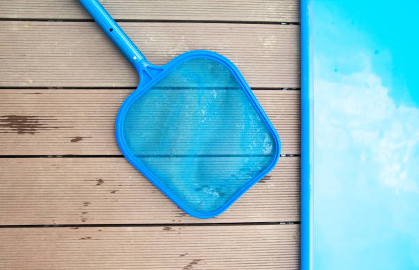istock Nets for cleaning the swimming pool, maintenance concept 1443001357