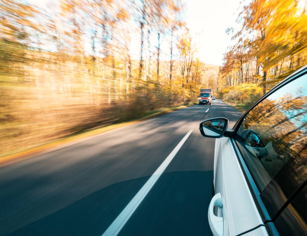 istock Driving on the road on a beautiful autumn day 1443002357