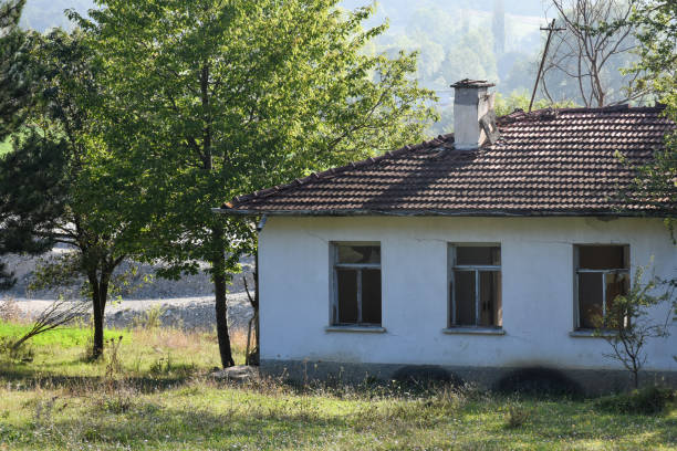 istock Old and abandoned house building in the forest 1443006683