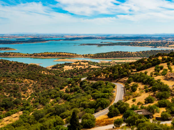 Impressive view of Alqueva lake, artificial bassin that impounds the River Guadiana, on the border of Beja and Evora Districts in the south of Portugal stock photo