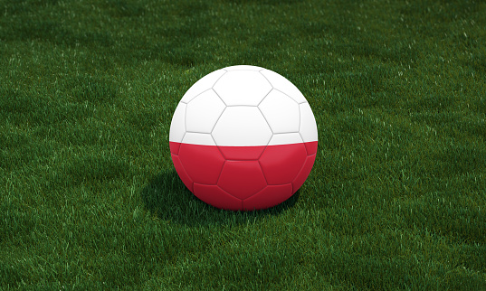Soccer ball with Poland flag colors at a stadium on green grasses background. 3D illustration.