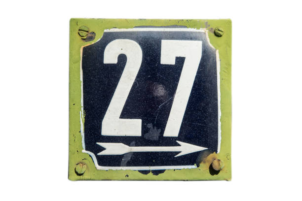 istock Weathered enameled plate number 27 1443022503