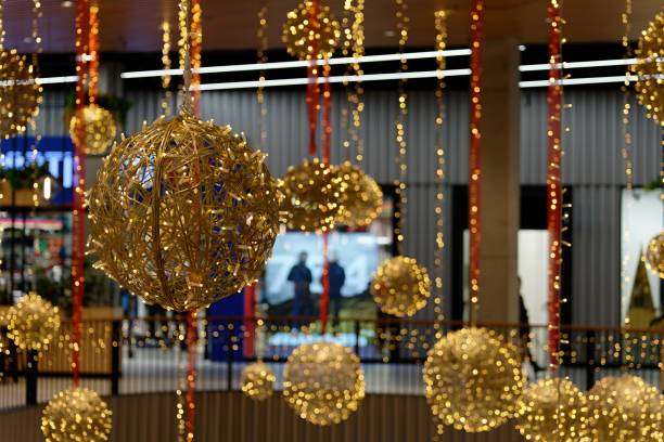 istock Ornaments and lights on the decorated Christmas tree. 1443023713