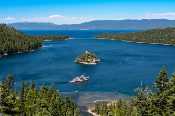 Emerald bay The paddle wheel powered tourist excursion vessel Dixie II explores Fannette Island in Emerald Bay on Lake Tahoe. Fannette is the only island on Lake Tahoe.
Lake Tahoe, California, USA
06/27/2022 robert michaud stock pictures, royalty-free photos & images