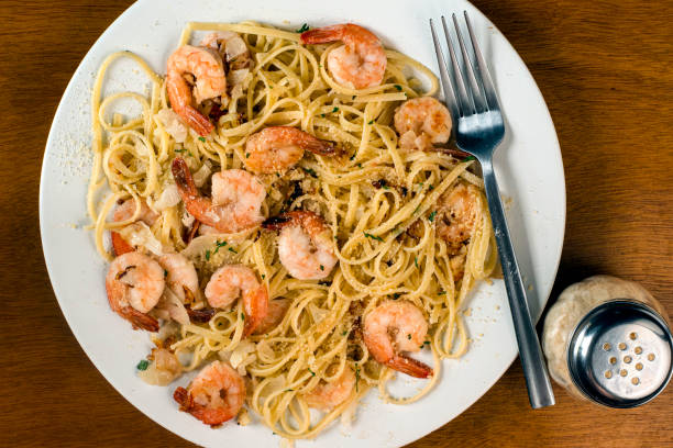 istock linguine top with sauteed shrimp  and parmesan cheese 1443032037