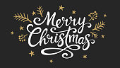 istock Merry Christmas hand lettering calligraphy on dark background 1443042358
