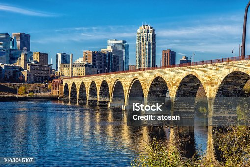 istock Downtown Minneapolis, Minnesota as seen from the famous stone arch bridge 1443045107