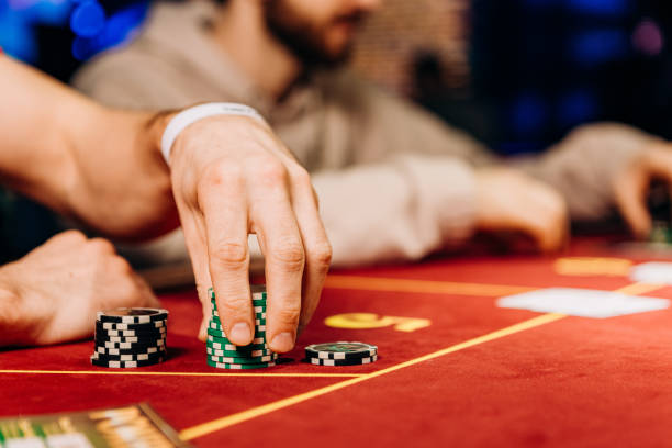 istock casino betting chips poker table gambling win 1443047478