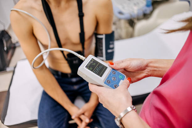 istock Doctor checking blood pressure to a patient 1443049959