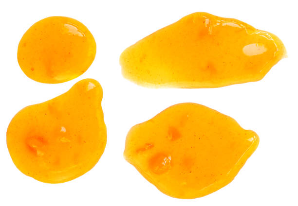 istock Orange fruit  jam isolated on white background, top view. Pattern. Orange or mandarine spread  Flat lay collectin 1443050725