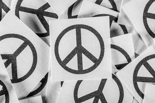 Peace symbols written on paper