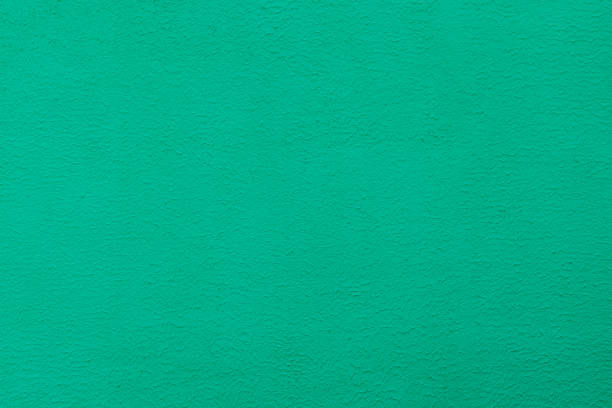 istock Green plaster wall texture. Painted wall green textured wall. 1443057854
