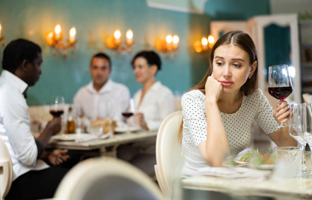 istock Sad lady at the restaurant table 1443058814