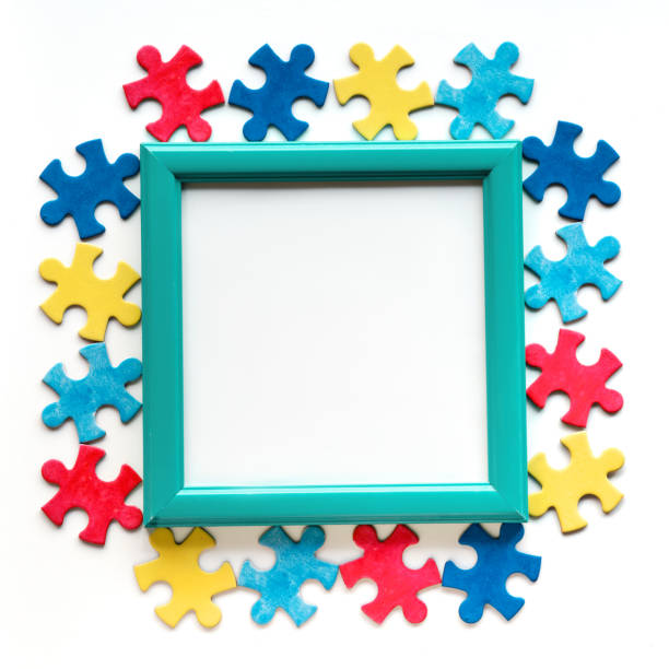 istock Autism Awareness Day, World Autism Day, square frame with puzzle pieces, copy-space. Design element or background for flyer, poster for Health Care Autism Awareness campaign. 1443058867