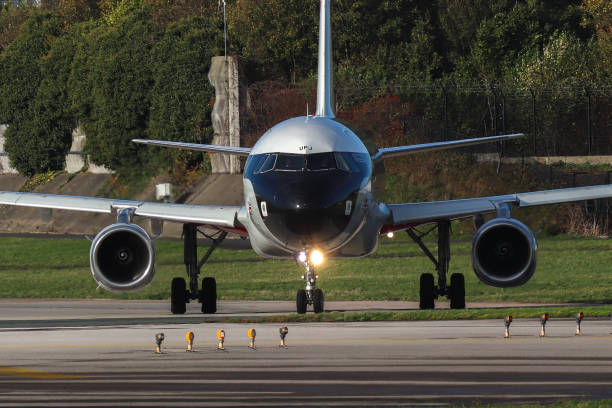 Manchester Airport, United Kingdom - 3 November, 2022: British Airways Airbus A319 (G-EUPJ BEA Retro) taxiing towards runway 23R for take off to Heathrow.
