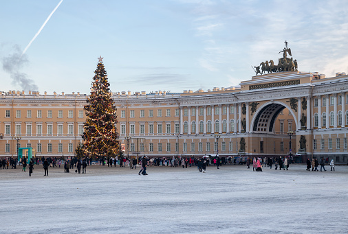 St. Petersburg, Russia - January 08, 2022: Christmas tree on Palace Square. Many people visit Palace Square on New Year's holidays